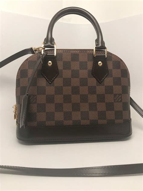 louis vuitton alma bb with damier ebene canvas|Louis Vuitton Damier Ebene clutch.